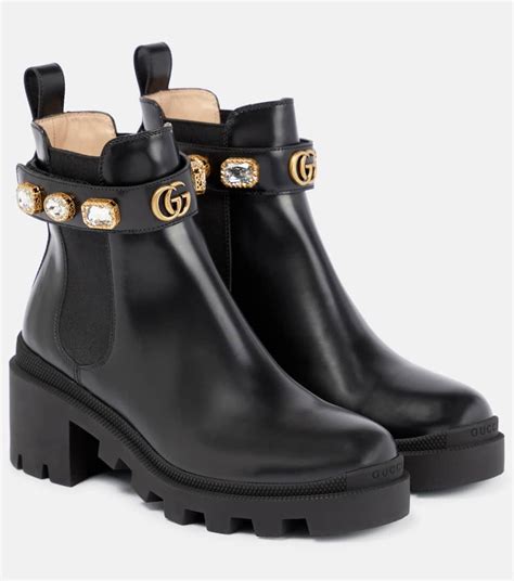 gucci black boots with snake on bottom